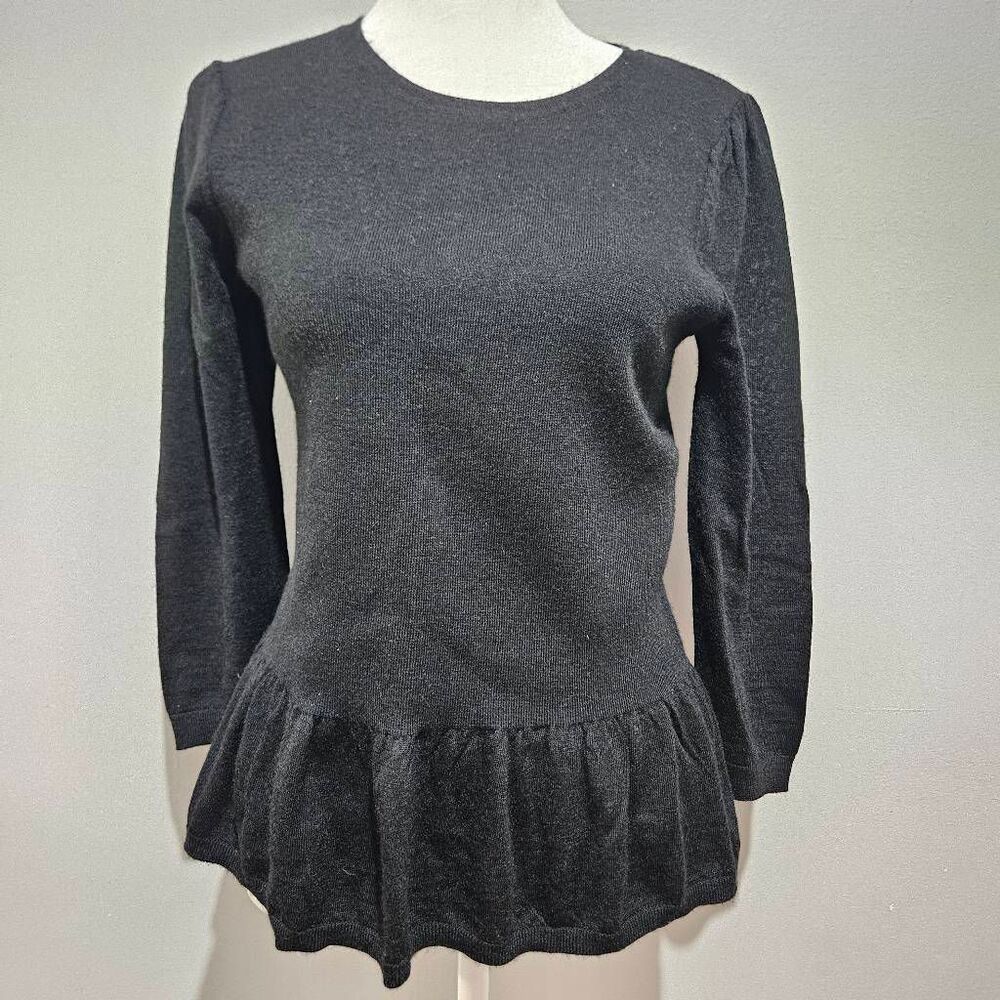 black crewneck peplum sweater from LOFT features a fine-knit texture, long sleev